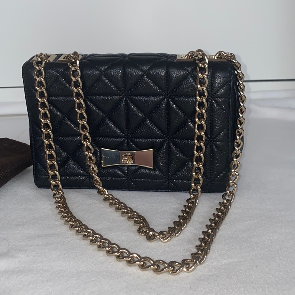 Kate Spade Crossbody purse with gold chain and quilted leather.